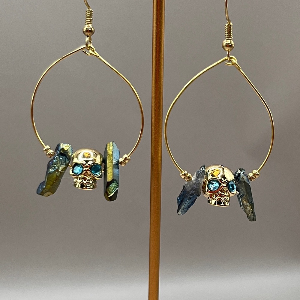 Gold Skull Earrings with Blue Accents